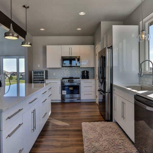 Moda Stone Countertops & Woodland Cabinetry